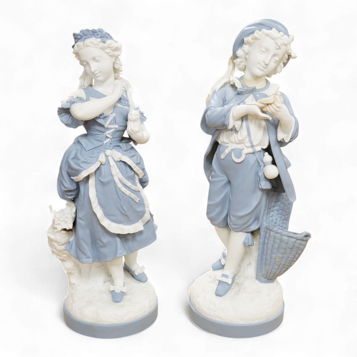 A pair of French part-bisque figures, 57cm high
